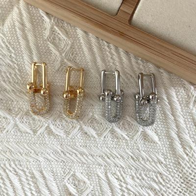 China New Fashion Diamond Insert Copper Style Earrings Geometric Double Ring Lock Stud Earrings HOT TRENDY U Lock Stud Earrings for sale