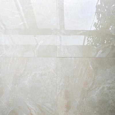 China Foshan porcelain tiles 600mm cream marfil polished ceramic floor tile spanish golssy polished excellent quality light color eco-friendly for sale