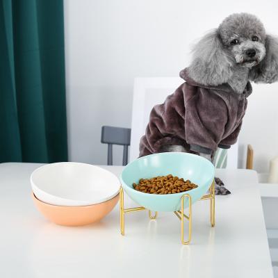 China Luxury designer ceramic color pet bowls cute pet bowl with gold stainless steel for dog cat for sale