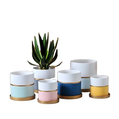 China Modern Nordic Modern Ceramic Flower Pot Designer Colorful Pots For Indoor Garden Planter Pots for sale