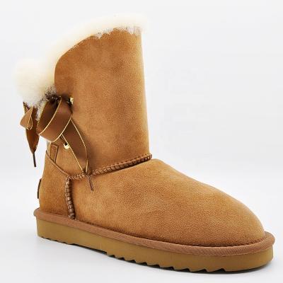 China Winter Anti-skid Women's Snow Walking Boots Suede Fur Striped Warm Boots Fully Pull On Round Toe Waterproof Flat Bottom Boots for sale