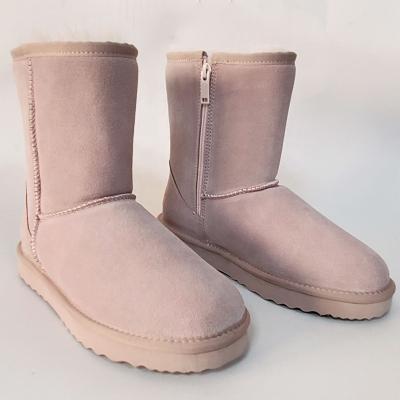 China Fashion trend fluffy winter boots waterproof classic wool fur ankle snow genuine leather cheap walking boots with zipper for women for sale