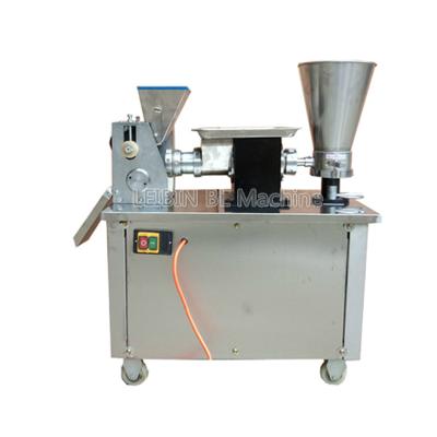 China automatic samosa machine/electric dumpling machine/spring roll machine 750*520*850mm for sale