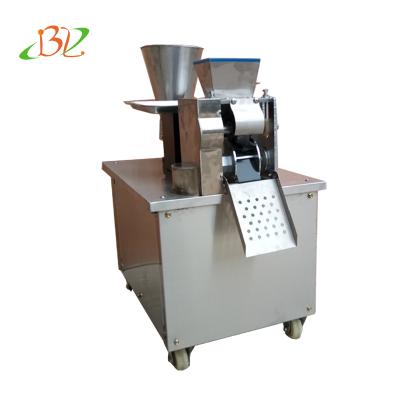 China samosa making machine/dumpling machine/spring roll machine 750*520*850mm for sale