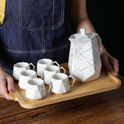 China Luxury Ceramic Tea Sets Stocked Irregular Shaped Drinkware Coffee Set Nordic White Porcelain Teapots With Coffee Cup for sale