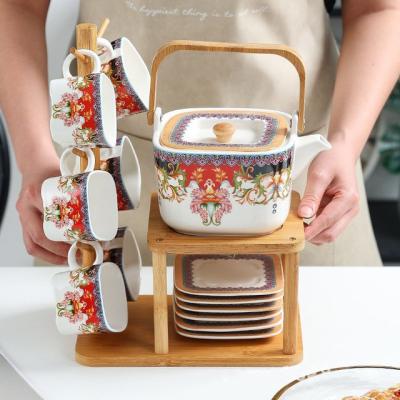 China Japanese Style Exotic Afternoon Tea Sets Teacup Stored Saucer Set Tea Set With Holder Square Porcelain Ceramic Bohemian White Stocked for sale