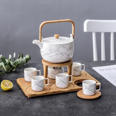 China Fancy Ceramic Cups And Saucers Wholesale Nordic Afternoon Coffee Teapot Stocked Ceramic Tea Set With Wood Tray for sale