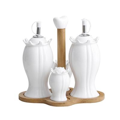 China Wholesale Fancy 4pcs Kitchen Spice Salt Grinder Ceramic Spice Oil Set Condiment Bamboo Base Set for sale