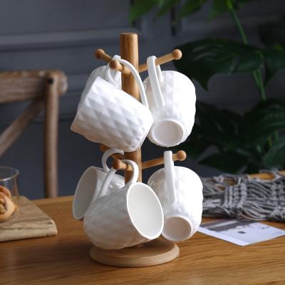 China Viable Style Simple Handmade Ceramic Mugs White Tea Cup Sets Custom Embossed Ceramic Coffee Mug For Sale for sale