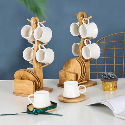 China Viable Espresso Minimalism Style Custom Made Porcelain Cups White Ceramic Coffee Mug Set With Wooden Stand for sale