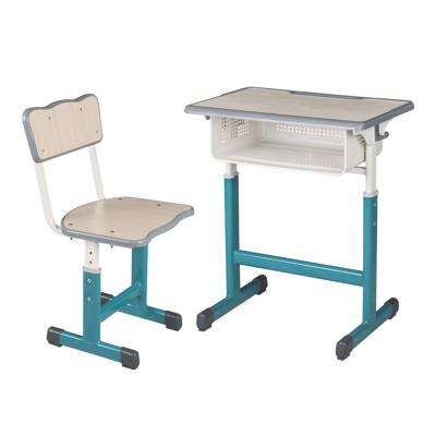 China Simple Colorful Height Adjustable Wooden Student Desks And Chairs For School Furniture for sale