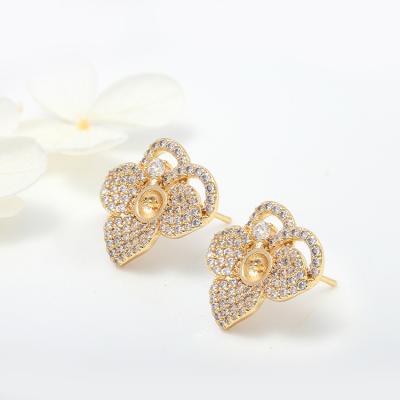 China FASHIONABLE Unique Design 14K Gold Plated Box Set Pearl Bow-knot Sunflower Clover Shape Stud Earrings for sale