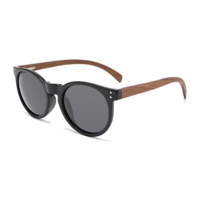 China Wooden Sunglasses 2021 Fashionable Round Frame Shade Wooden Sunglasses Polarized Sun Lenses for sale