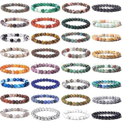 China Kimter CLASSIQUE 40 styles 8mm natural Stone Crystal Gemstone Healing Beaded Elastic bracelets unisex for sale