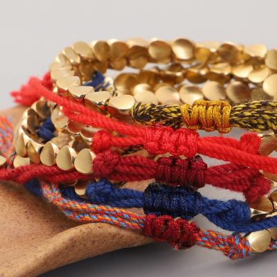 China BOHEMIA Hand - Woven Tibetan Buddhist Bead Cord Bracelet Lucky String Braided Irregular Copper Bracelet Kimter-Q509FZ for sale