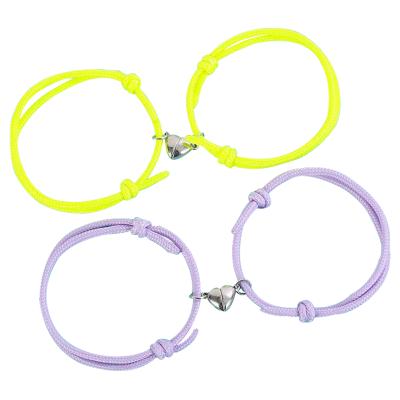 China Bright Rope BOHEMIA Heart Braided Bells Magnetic Adjustable Bracelet For Couples Best Friend Q594FZ for sale