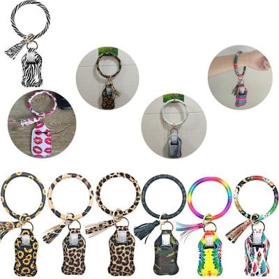 China Neoprene Hand Sanitizer Hand Sanitizer Bottle Holder Wristband Wristband Key Chain Tassel Leather Keychains With 30ML Bottle Kimter-X518FZ for sale