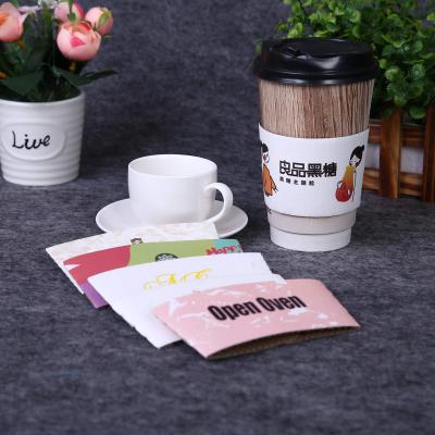 China Disposable Custom Kraft Paper Cup Sleeve Holder Heat Insulation Corrugated Coffee Cup Sleeves for sale