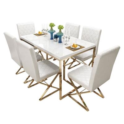 China (Other)Adjustable luxury gold stainless steel dining table with marble top for dining room furniture dining table set for sale