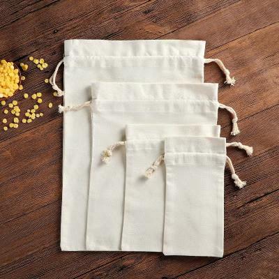 China Cotton Eco-Friendly Organic Canvas Reusable Bulk Trash Bags For Food Fruit Vegetable Storage Drawstring Pouch Bag for sale