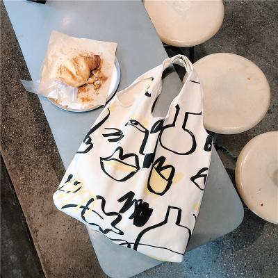 China Custom Canvas Reusable Tote Bag Shopping Bag Reusable Logo Cotton Durable Graffito Canvas Tote for sale