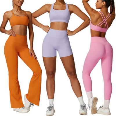 China Breathable Women's High Quality Breathable Sports Bra Yoga Tight Shorts Pants Leggings Suit Set Cross Back Thin Strappy High Waist Peach for sale