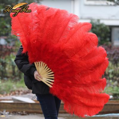 China Large Hand Bone Ostrich Feather 13 Stage Fancy Stage Performance Ostrich Feather Fan Wedding Bridal Feather Fan for sale