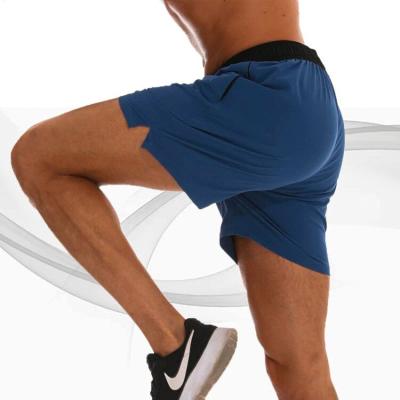 China Anti-Wrinkle Casual Men's Gym Fitness Shorts Sports Elastic Loose Quick Dry Shorts Shape Breathable Basketball Shorts for sale