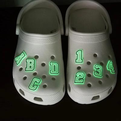 China Glow waterproof whosaleshoe charm diy letters A-Z fashion new design soft PVC croc decoration your style shoe charm luminous croc for sale