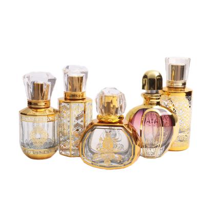 China 30ml 50ml gold glass cosmetic luxury hot stamping perfume bottle with gold sprayer fine mist factory wholesale for sale