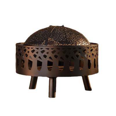 China Round Hollow Iron Fire Pit Luxury Camping Outdoor Fire Ring for sale