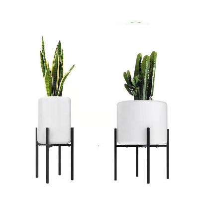 China Minimalist Metal Plant Stand Flower Pot Holder Outdoor Adjustable Modern Indoor Stand For Living Room for sale