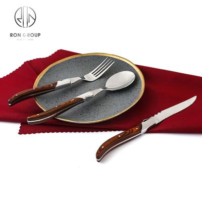 China Sustainable Hotel Restaurant Eco - Friendly Silver Cutlery With Wooden Handle Reusable Stainless Steel Cutlery Set for sale