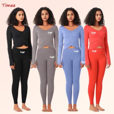 China Breathable New Design Long Sleeve Workout Gym Tops Women Seamless Long Sleeve Workout Gym Set Women Sets for sale