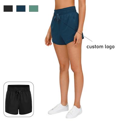 China Breathable Yoga Shorts Running Solid Color No Line Sports Shorts Women Fitness Stretch Tight T Shorts for sale