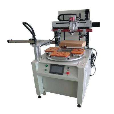 China Automatic Masking Rotating Factory Work Table Screen Printer Printing Machine With Sevro Mechanical Arm for sale