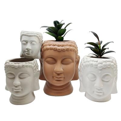 China Buddha Planter's Face Ceramic Flowerpot Customized Modern Head Ceramic Buddha Pot For Home Decor for sale