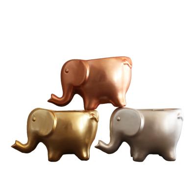 China Modern Ceramic Elephant Shaped Flower Plant Pots Animal Flowerpot for sale