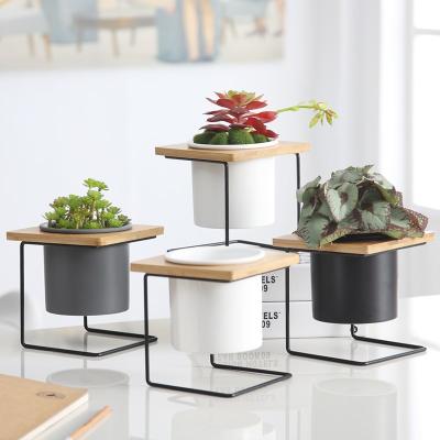 China 2022 New Iron Frame Modern Ceramic Nordic Minimalist Wood Table Desk Small Matte Flower Pot for sale