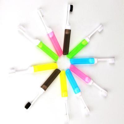 China Adults Custom Toothbrush Soft Colorful Plastic Handle Soft Stiffens Travel Folding Toothbrush for sale