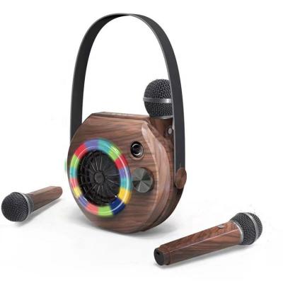 China Shenzhen Factory No Shock Stereo Bass Portable 2 In 1 Speaker Home Radio Colorful RGB Speaker With Strap for sale