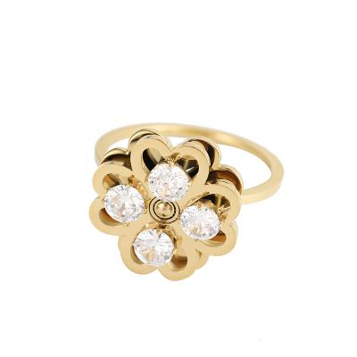 China 2021 Environmental Friendly Trending Style Stainless Steel Gold Plated Hollow Out Design Ring Four Leaf Crystal Ring for sale