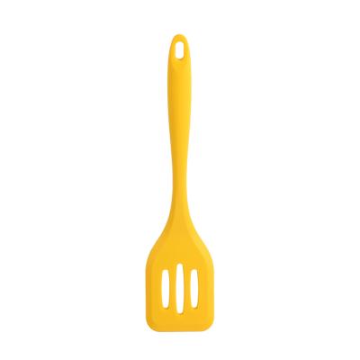 China Sustainable Food Grade Silicone Nonstick Kitchen Cooking Slotted Turner In Yellow Color for sale