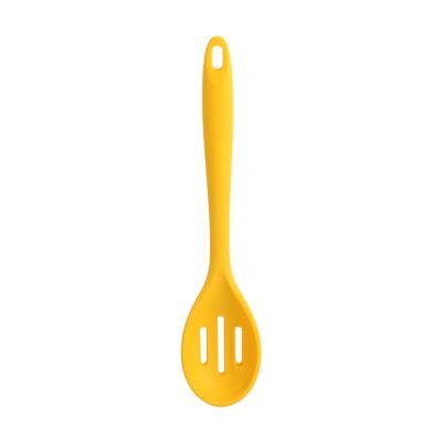 China Sustainable Food Grade Silicone Nonstick Kitchen Cooking Slotted Spoon In Yellow Color for sale