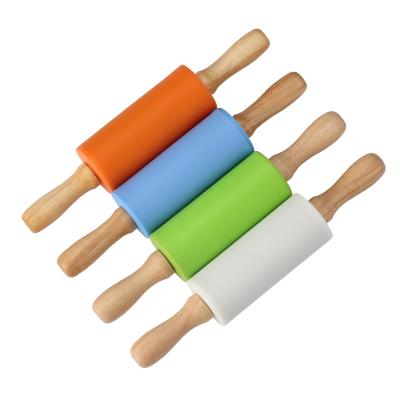 China Sustainable Wooden Quick Delivery Handle Silicone Kids Mini Dough Pin For Children for sale