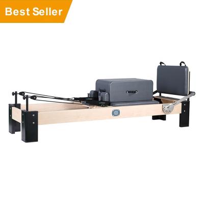 China ONEMAX Pilates Home Body Fit Exercise Bed Pilates Reformers Maple Wood Core Reformers Equipment Training Machine For Sale for sale