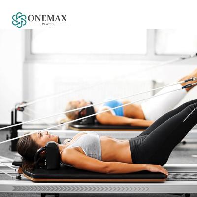 China Aluminum Body Fit Exercise Reformers ONEMAX Pilates Machine Home Pilates Machine Hot Home Studio Pilates Yoga Machine for sale