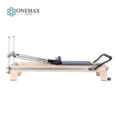 China ONEMAX studios hot selling pilates machine reformer type good quality cadillac pilates elina pilates home use maple wood for sale