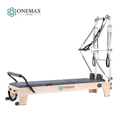 China Fitness ONEMAX exercise pilates reformer cadillac half tower half trapeze pilates natural maple reformer and wood pilates reformer machine for sale