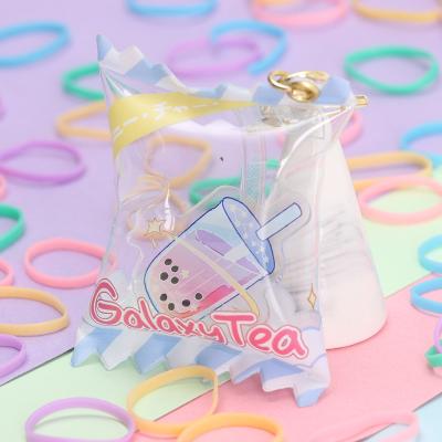 China Promotion Gift/Souvenir No MOQ Custom Milk Tea Candy Key Chain Acrylic Shaker Keychain Charm With Gold Star Accessaries for sale